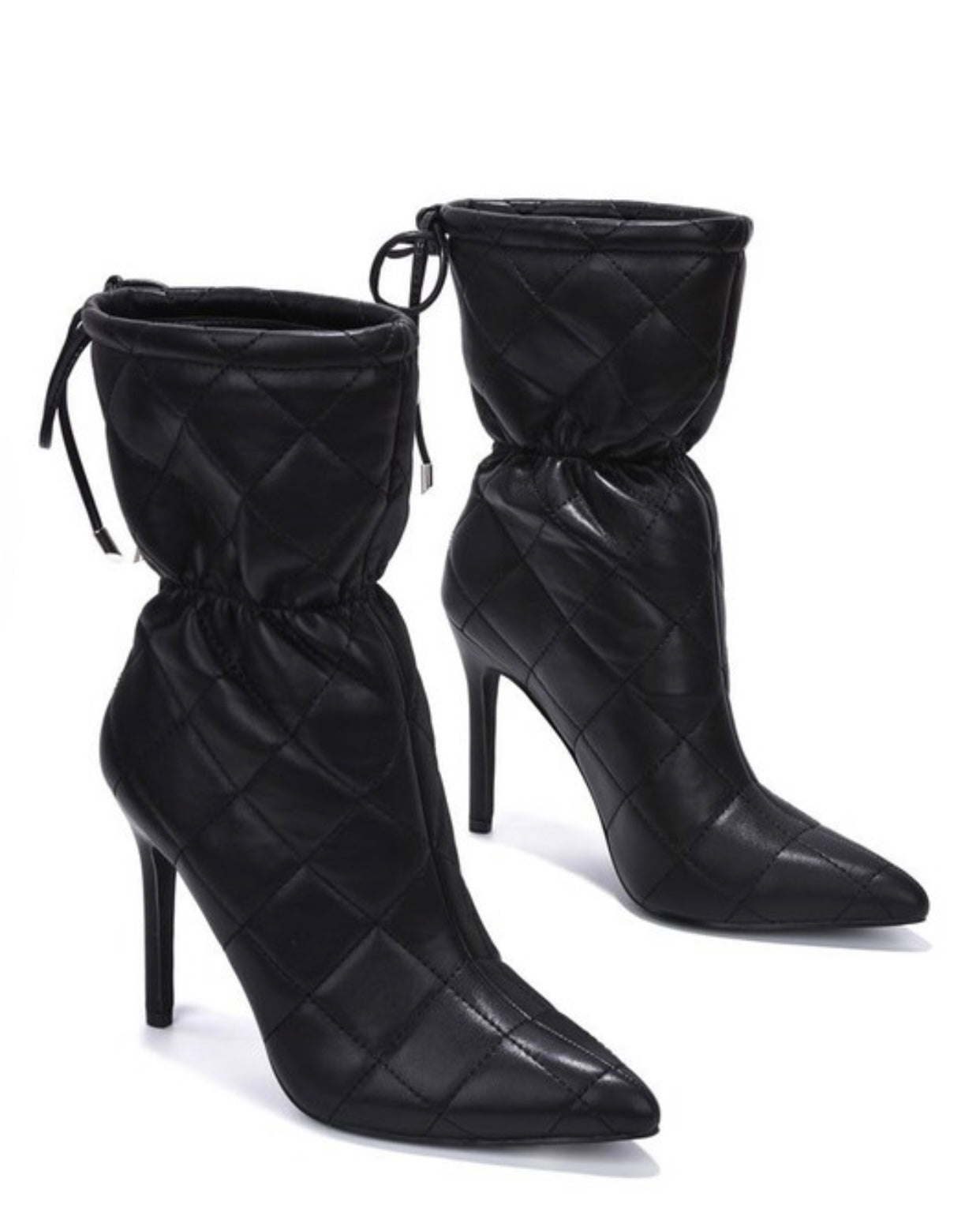 Keep it stylish in these mid boots! The quilted design and 4+ inch heel give the perfect mix of style and comfort. Easy to dress up or down, they go with anything.

Available in multiple sizes
Quilted pattern
4+ inch heel
Comfortable fit
Wear them with jeans, dresses, or a cute set!