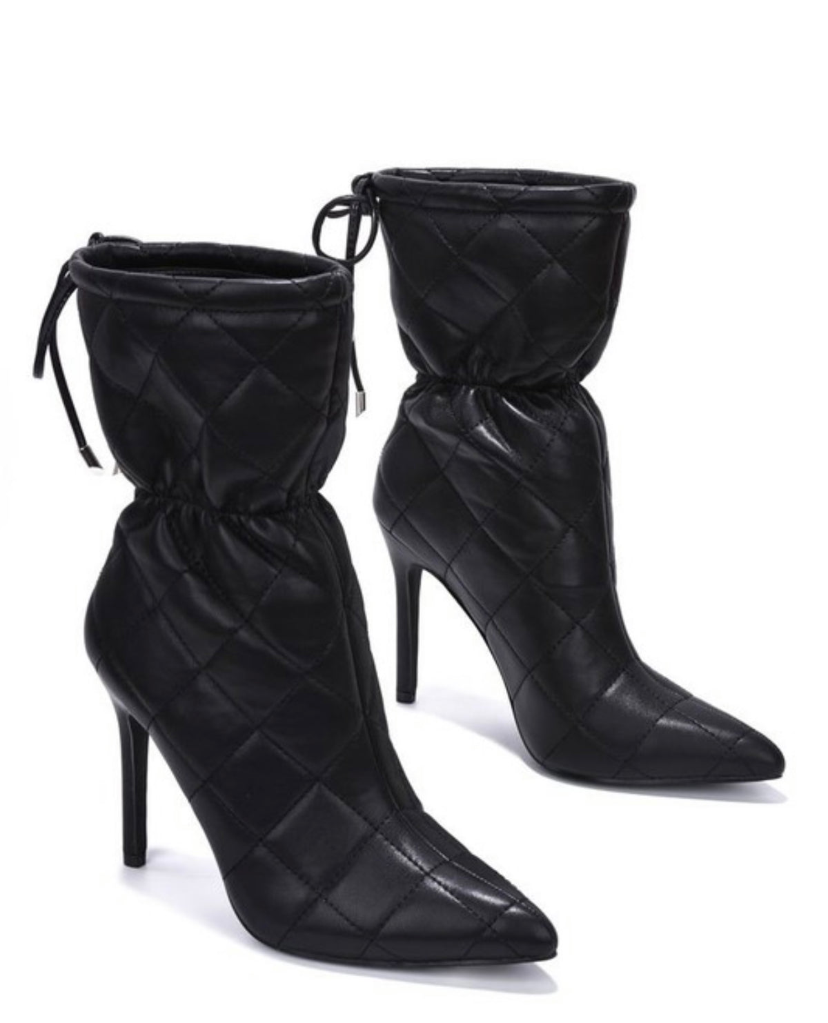 Keep it stylish in these mid boots! The quilted design and 4+ inch heel give the perfect mix of style and comfort. Easy to dress up or down, they go with anything.

Available in multiple sizes
Quilted pattern
4+ inch heel
Comfortable fit
Wear them with jeans, dresses, or a cute set!