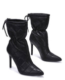 Keep it stylish in these mid boots! The quilted design and 4+ inch heel give the perfect mix of style and comfort. Easy to dress up or down, they go with anything.

Available in multiple sizes
Quilted pattern
4+ inch heel
Comfortable fit
Wear them with jeans, dresses, or a cute set!