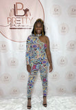 Turn heads in this bold one-shoulder jumpsuit! The mesh abstract print and curve-hugging stretch give the perfect mix of sexy and stylish. Long sleeve add a sleek touch while keeping it comfortable.