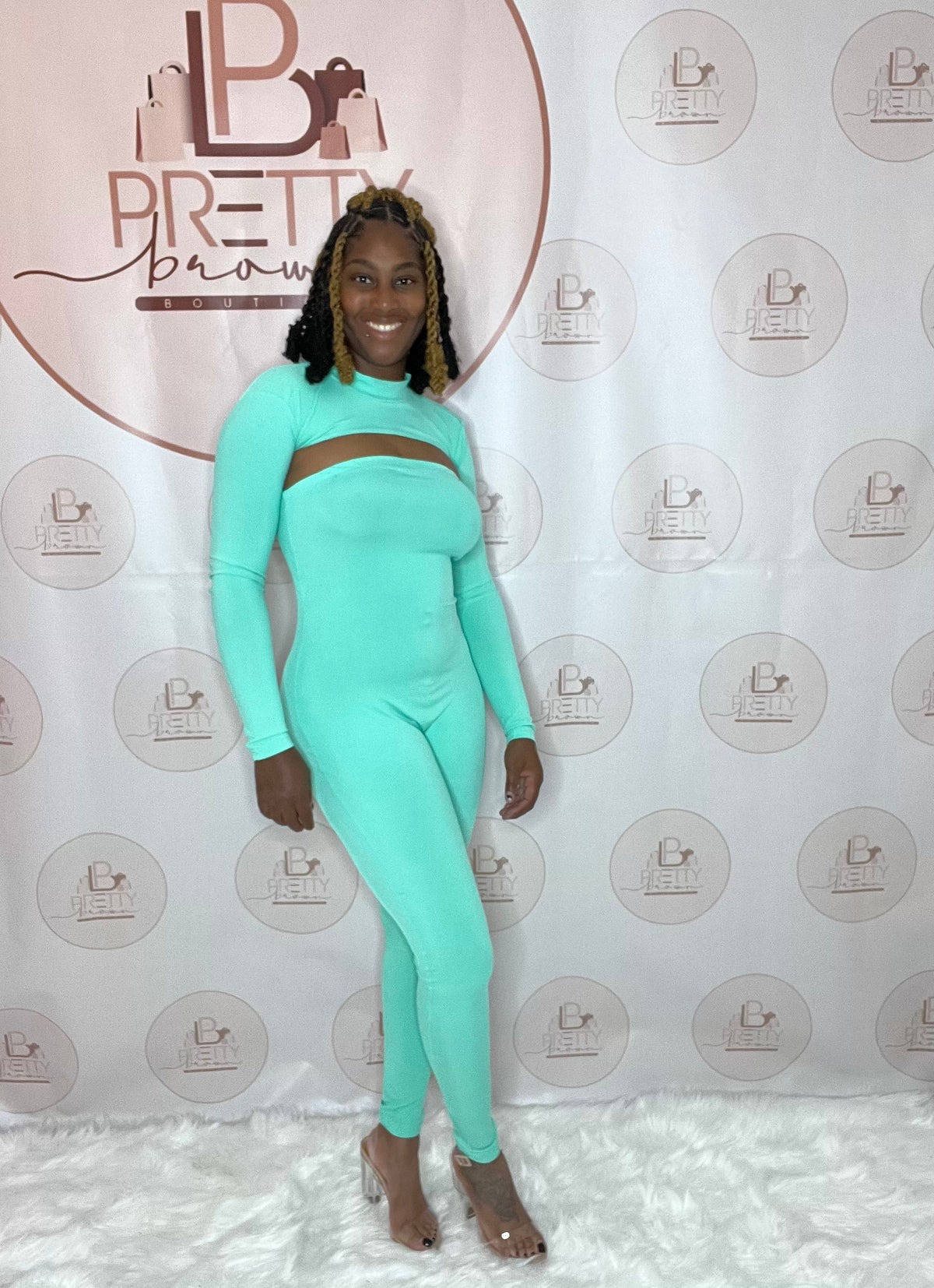 One of our best sellers! The bright teal color pops on every skin tone, while the cut-out detail shows just the right amount of skin. The long sleeves keep it sleek, and the stretchy fit makes it comfy enough to wear all night.

-Available in S, M, L, &amp; XL
-Stretchy &amp; comfortable
-Cut-out detail
-Long sleeves