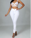 This two-piece set features a bandaged bra with adjustable straps, underwired support, and a hook and eye closure for the perfect fit. The high-waisted pants are ruched with a drawstring and a button zipper closure for a sleek, flattering look.
