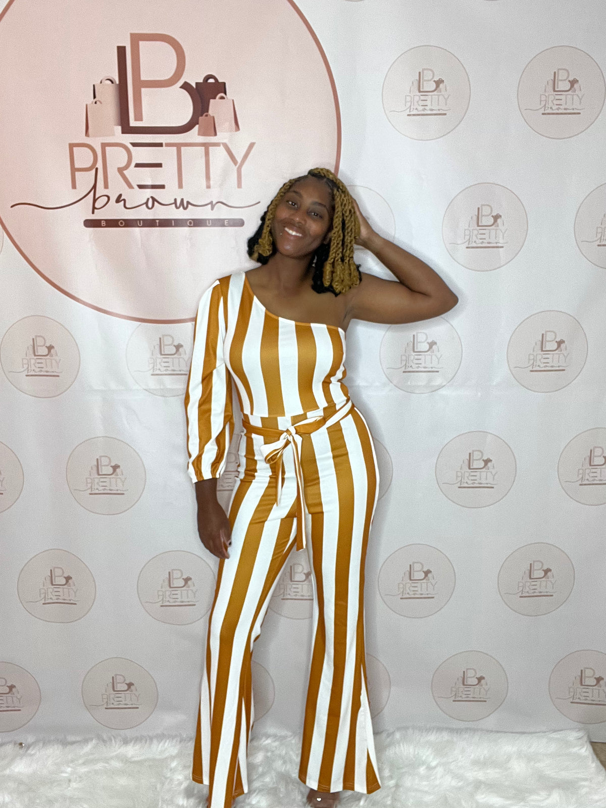 The Destiny Jumpsuit is here to bring that effortless chic look! Featuring a one-shoulder design with a flattering waist tie and stripe detailing, this wide-leg jumpsuit is perfect for any occasion. Made with stretchy cotton, it's comfortable, stylish, and ready to slay.