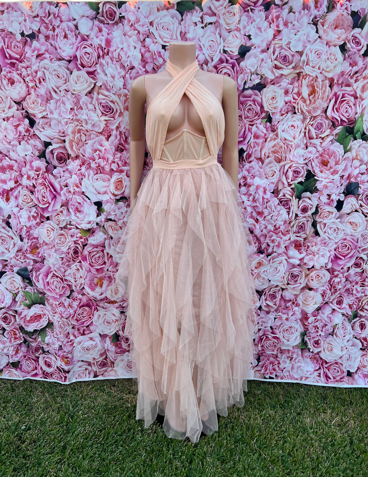 This non-stretch satin dress brings the drama with a tulle layer bottom and a sheer finish, while the underwire halter neckline gives the perfect shape.

-Halter neckline
-Underwire detail
-Sleeveless
-Satin with tulle bottom
-Sheer with attached undergarment
-Snap crotch &amp; zipper closure