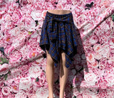 The Joyce Babe Skirt is your new go-to for a cozy, stylish look.

-Flannel fabric for comfort and warmth
-Elastic waistband with a self-tie waist
-No closure for easy wear
-65% polyester, 35% cotton