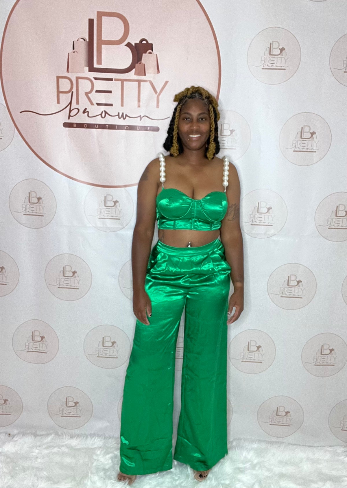 The Gabbie Pant Set is perfect for your next brunch date! This satin green set features a sweetheart neckline crop top with faux pearl straps and high-waisted pants with pockets.

-Satin fabric
-Sweetheart neckline &amp; sleeveless
-Faux pearl straps
-High-waisted pants with pockets
-Zipper closure, Nonstretch