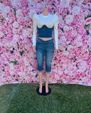 The By Xyra Top gives the best of both worlds! This cropped top mixes denim and white cotton for a bold, layered look. The denim bust adds structure, while the long-sleeve shirt keeps it classic.

-Cropped fit
-Denim underbust detail
-White cotton top half &amp; sleeves