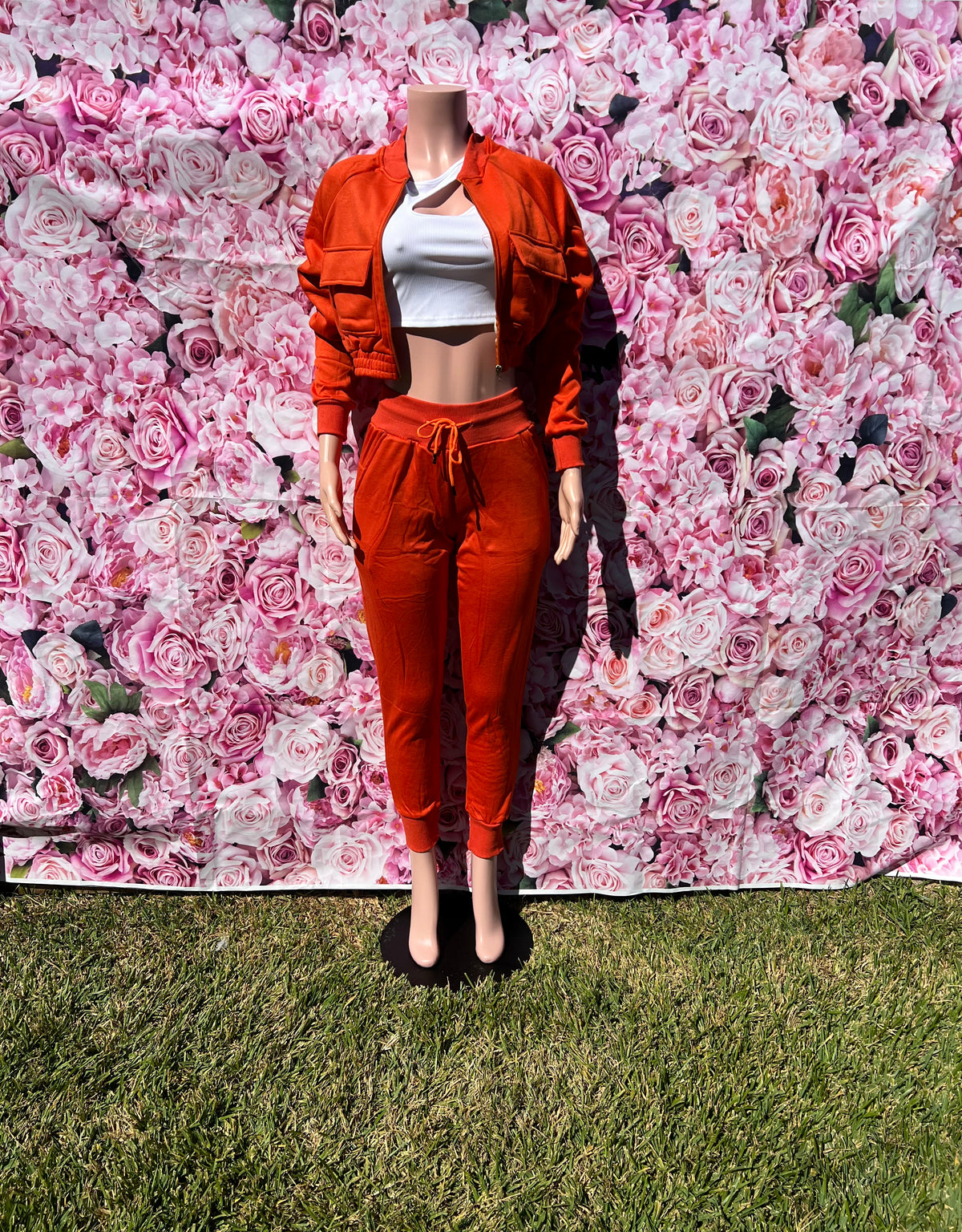 Keep it cute and comfy in this two-piece set! The cropped top with long sleeves and a zipper closure pairs perfectly with the high-waisted joggers featuring an elastic waistband, drawstrings, and pockets.

-Cropped top with long sleeves
-Zipper closure
-High-waisted joggers
-Elastic waistband &amp; drawstrings
-Pockets