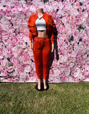 Keep it cute and comfy in this two-piece set! The cropped top with long sleeves and a zipper closure pairs perfectly with the high-waisted joggers featuring an elastic waistband, drawstrings, and pockets.

-Cropped top with long sleeves
-Zipper closure
-High-waisted joggers
-Elastic waistband &amp; drawstrings
-Pockets