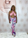 The Cross Wrapped Pink Set is perfect for a day-to-night look! Featuring a cross-wrapped pink bra and abstract sexy pattern, this two-piece set is made from stretchy material for a super comfortable fit. Whether you’re heading to a daytime outing or hitting the club or lounge, this set has you covered.

Cross-wrapped pink bra
Abstract sexy pattern
Stretchy & comfortable material
Perfect for day or night